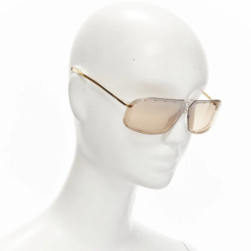 Lunettes de soleil GUCCI vintage Y2K GG2517/S AU3 or logo GG verres marron cloutés sheild