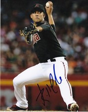 RANDALL DELGADO  ARIZONA DIAMONDBACKS   ACTION SIGNED 8x10