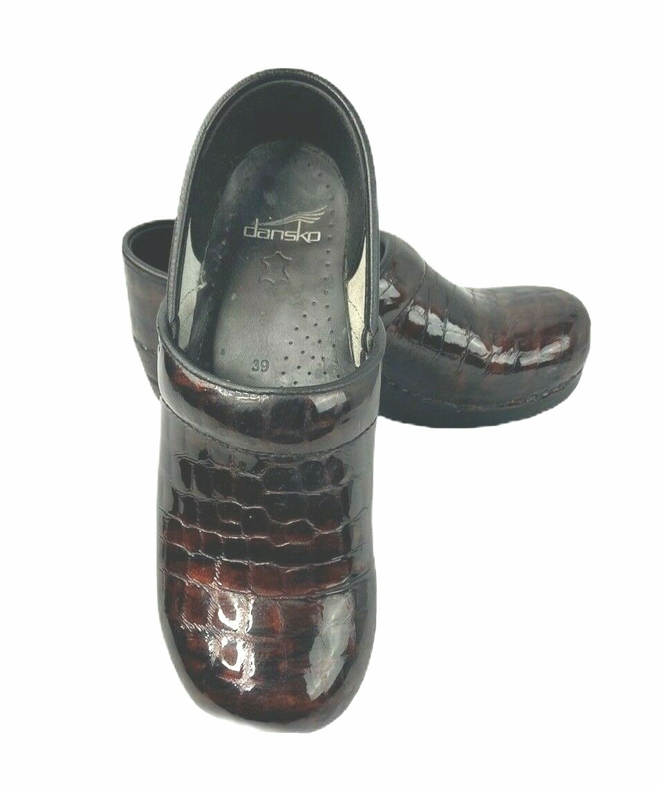 dansko snakeskin clogs
