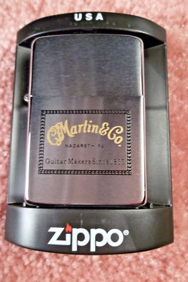 ZIPPO MARTIN GUITAR LIGHTER PREOWNED IN CASE LOOKS TO BE NEVER