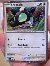 POKEMON SHROODLE #SVP099 PROMO BLACK STAR COSMOS NM CARD