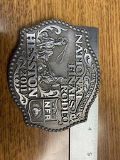 2011. Hesston NFR Montana Silversmith Belt Buckle. Measures 4x3