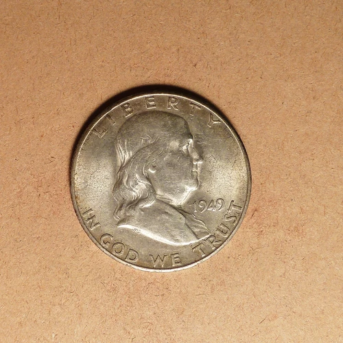 1949-S Franklin Half Dollar grades CH AU, Light Album Toning.