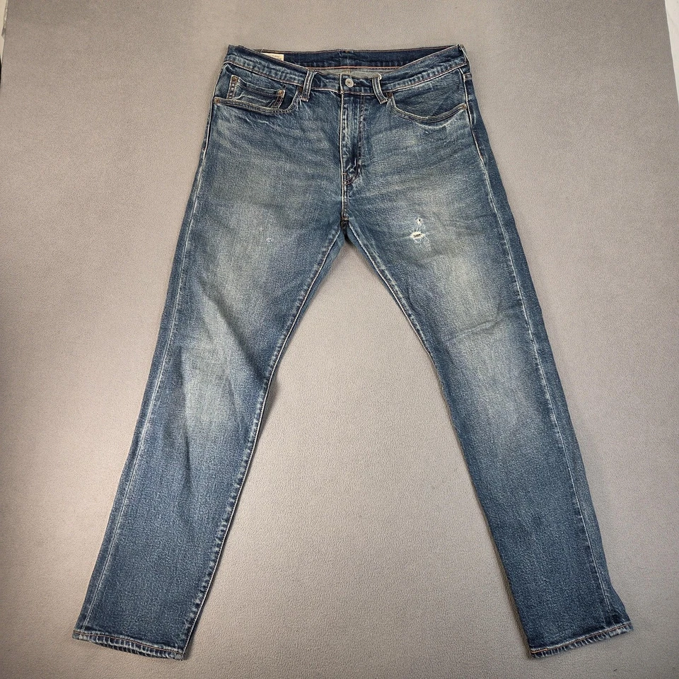 Jeans Levi's Premium 512 para hombre 32x30 ribete ajustado cónico desgastado etiqueta 34x32 Foto 2 de 4