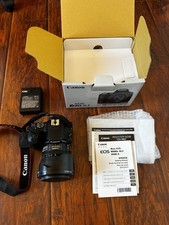 canon rebel sl3 camera with 15-85 lens