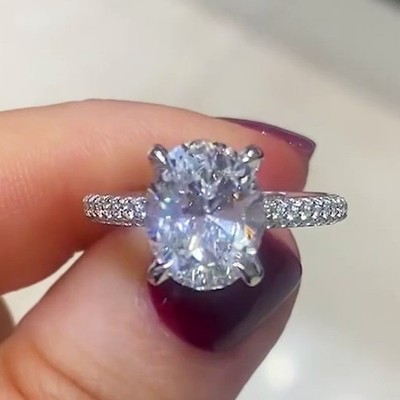 3.45 TCW Oval Cut Moissanite Hidden Halo Engagement Ring 14K White Gold Plated