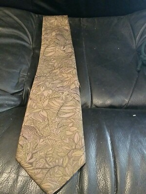 Tie Brand crocodile  Achiever Used Pattern  Is Leaves and leopard55 inches long 