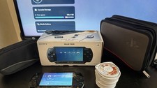 Sony PSP-1000 Value Pack Bundle – Boxed + 15 Games + Cases