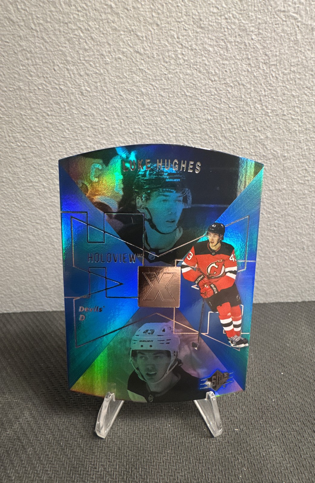 Luke Hughes #SPX-15 Hockey Cards 2023 Upper Deck SPx Holoview Retro trading card — raw and PSA graded price guide