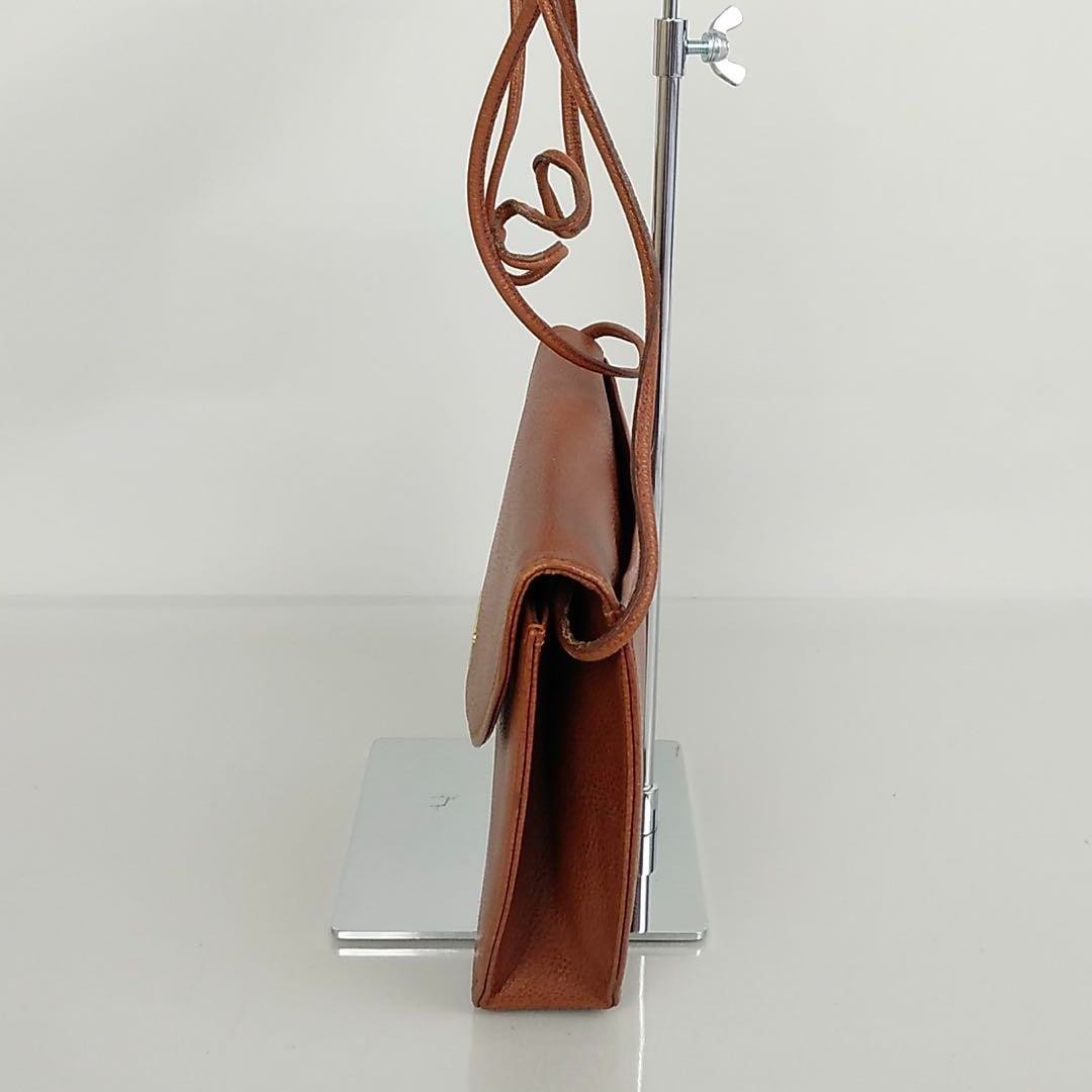 Borsa a tracolla Yves Saint Laurent Cassandra triangolo logo pelle marrone moda