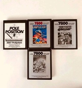 Atari 7800 console with 35 games, 2 controllers, power cord, storage case WORKS