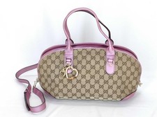 Borsa a tracolla Gucci pelle GG rosa beige oro ferramenta logo chiusura tela