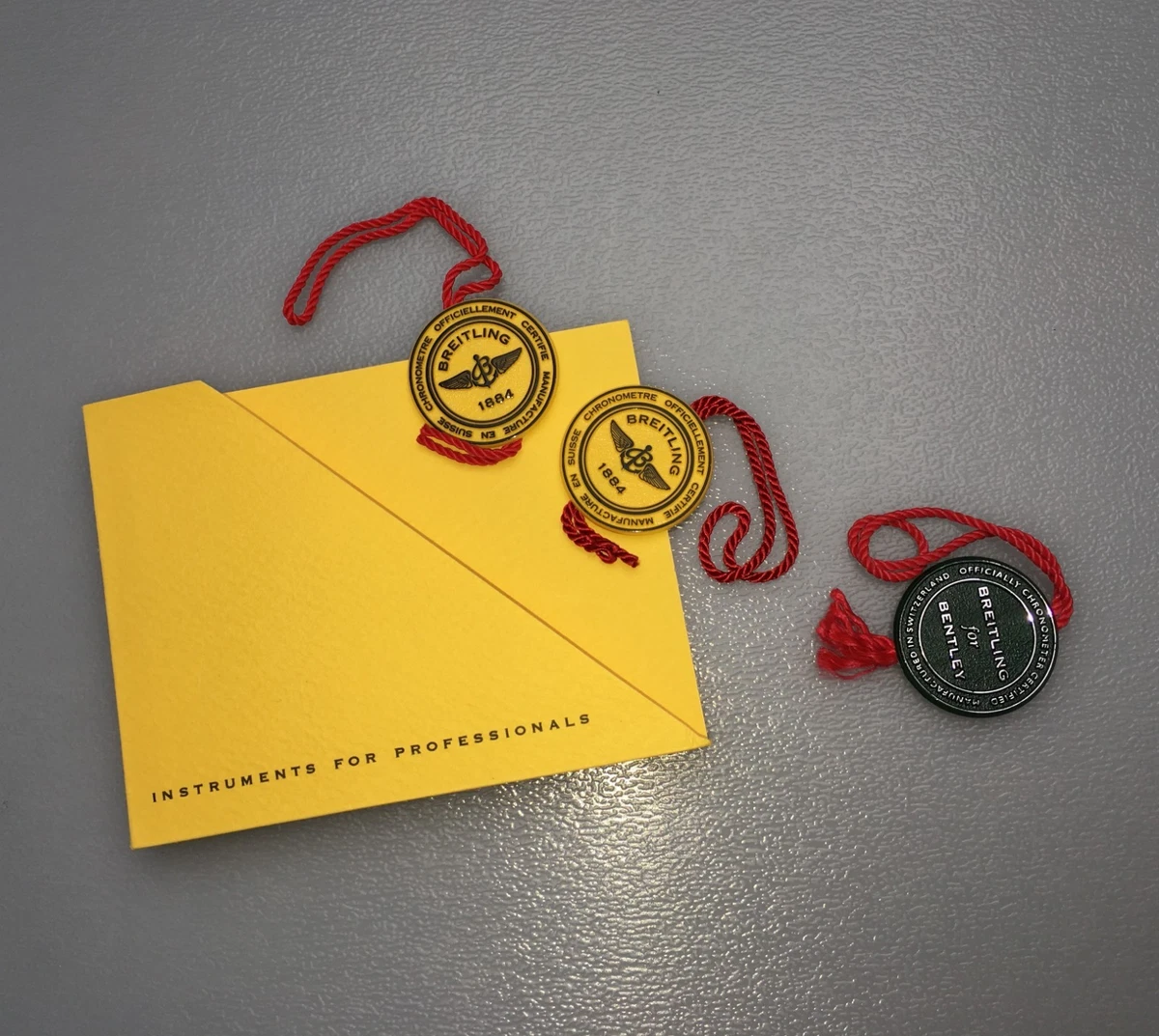 3 etiquetas colgantes Breitling para caja Bentley verde amarillo Navitimer Chronomat