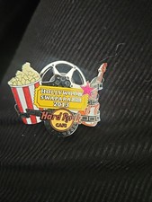 Spilla “Hard Rock Cafe Hollywood Swapaparazzi 2013 – Film Reel Guitar – Spinner”