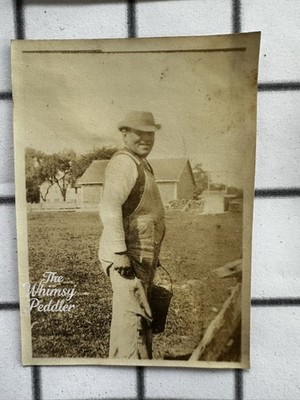 Vintage Farmer in Overalls Snapshot Farm Worker Holding Pail Rural Barn Photo
