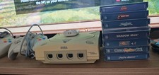 Sega Dreamcast PAL Video Game Console with VMU, 2 Controllers, and 8 Games