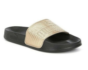 gold puma slides