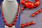 Vintage Antique Faturan Bakelite Cherry Amber Graduated Oval Beaded Necklace 33" — photo 1