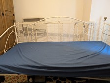 White Metal Frame Day Bed (double) with trundle and mattresses.  Collection only