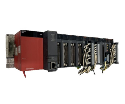 Mitsubishi Q04UDEHCPU Q-Series PLC w/ QX81 QY81P Q64AD2DA QD75MH2 Modules