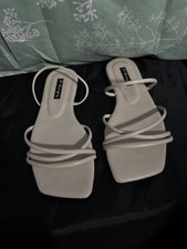 Beige strappy sandals with square toe