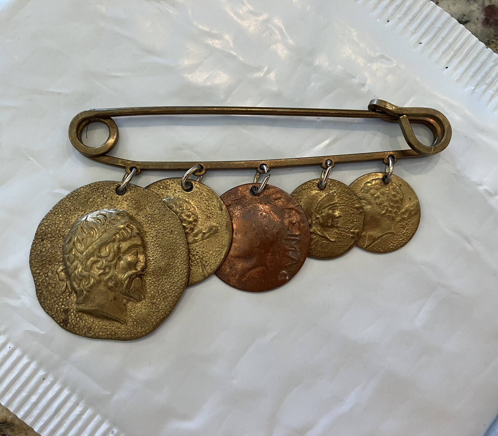 VINTAGE BRASS SAFETY PIN WITH 5 ANTIQUE ROMAN COINS CHARMS VERY LARGE 3