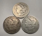 Lot of 3 - U.S. Morgan Silver Dollars - 1885 O, 1886 O, 1887 O, Circulated (M13)