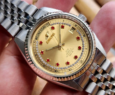 Vintage ENICAR uomo automatico 2169-51-37 25 Jewels day date QUADRANTE ORO ACCIAIO.