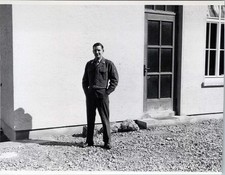 WW2 Photo Of US Army Soldier Standing By Barracks Door In Sunlight