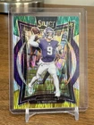 Select NFL 2024 JJ McCarthy RC Green Yellow Shock Vikings concourse SP Rookie