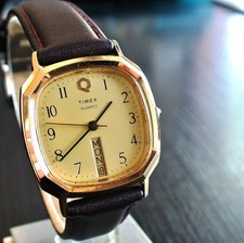 RELOJ DE VESTIR VINTAGE TIMEX Q M CELL DAY DATE CUADRADO CUARZO PARA HOMBRE CUERO DORADO