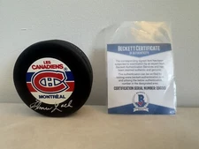 ELMER LACH SIGNED MONTREAL CANADIENS TRENCH PUCK BECKETT BAS COA X47103