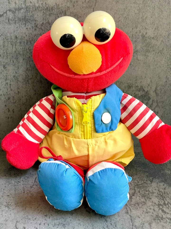 Juguete sensorial de aprendizaje para bebé de colección SESAME STREET ELMO Dress Me Up 1993 Tyco Foto 2 de 4