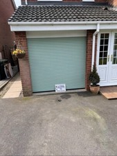 77mm insulated electric roller door in chartwell green