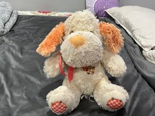 Stuffed Animal Dog plush with bow  plaid patches on stomach. Beige  10 inches.