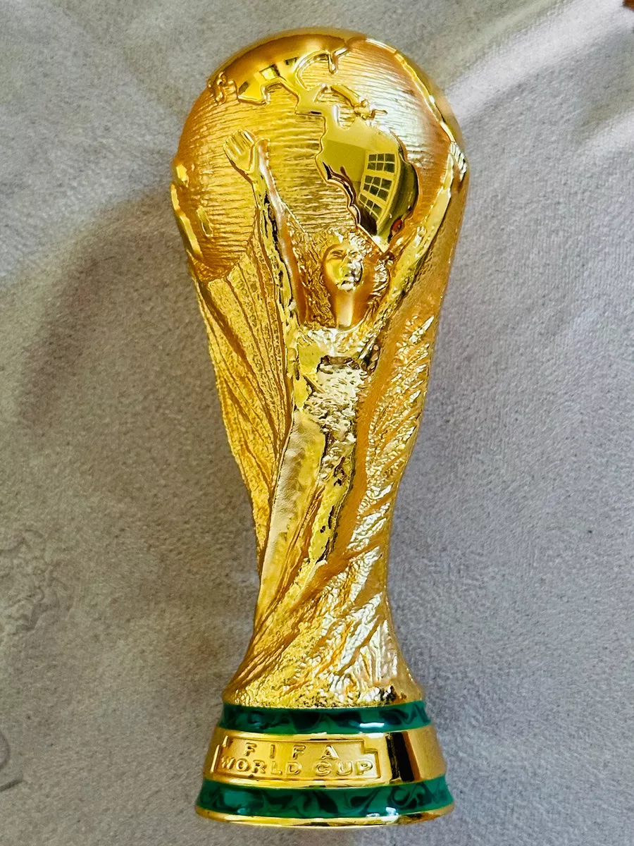 A miniature replica of the World Cup trophy presented by FIFA to