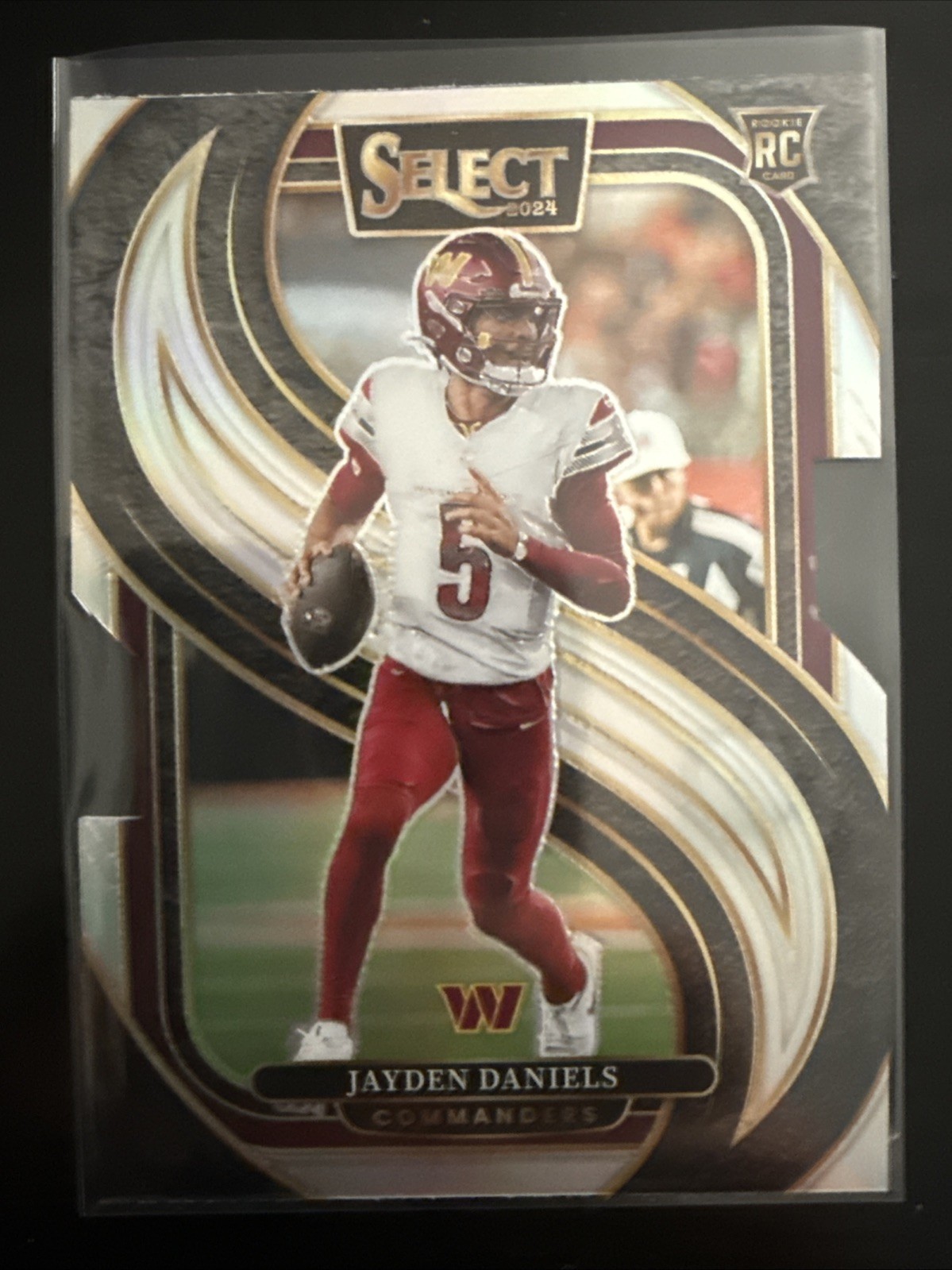 2024 Panini Select - Premier Level Jayden Daniels #112 Silver Prizm Die-Cut (RC)