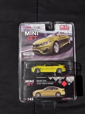 Mini GT 1:64 BMW M4 Austin Yellow Metallic MIJO Exclusive #143