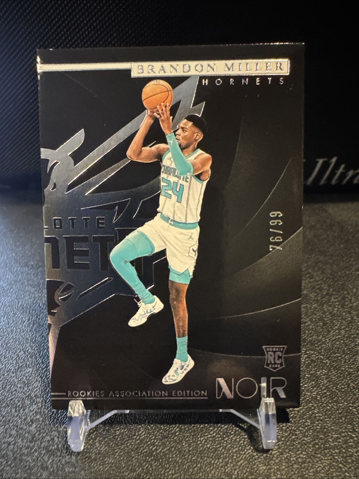 2023-24 Panini Noir - Rookies Association Edition #143 Brandon Miller /99 (RC)