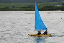 Photo 6x4 Laser Pico dinghy in Baltasound voe Junior sail training run by c2010