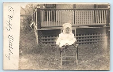 POSTCARD RPPC Baby Evelyn in Chair Front of Porch 1904-18