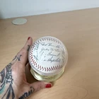 Autographed Baseball from 1957 Dodgers & Others in Gold Display Case