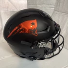 Mac Jones Autographed Patriots SpeedFlex Blacked Out Helmet (Beckett COA)
