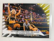 Toni Storm & Ember Moon def. Dakota Kai 2021 Topps WWE #96 Card