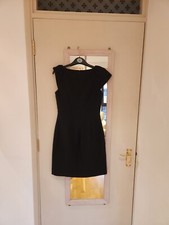 A/ Wear black dress size 10. Used