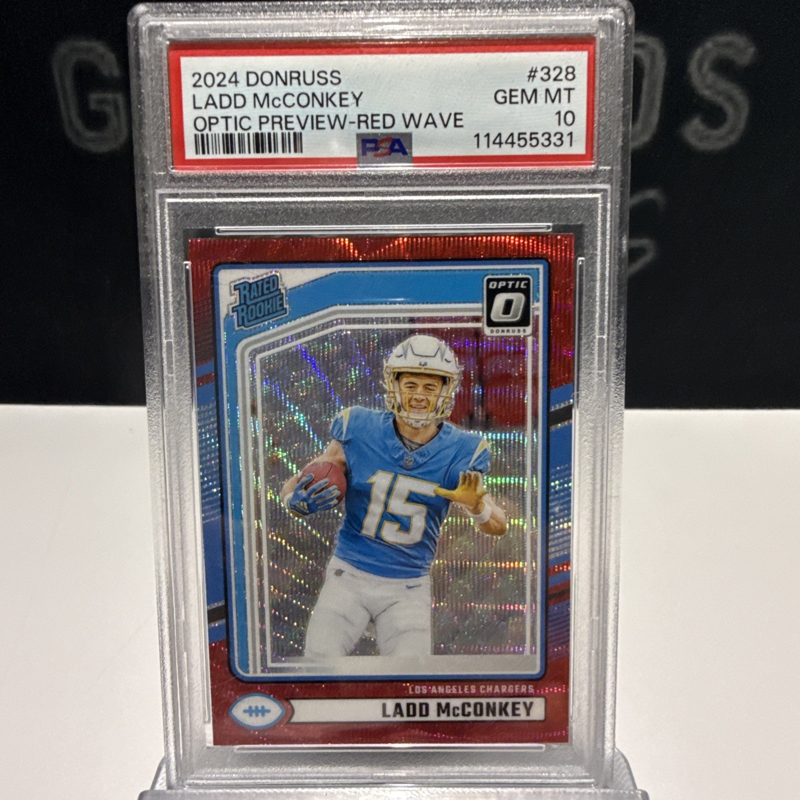 2024 Donruss Rated RC Ladd McConkey #328 Optic Preview Red Wave Prizm PSA 10