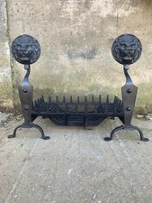 cast iron lion firedogs and swans nest basket