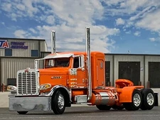 1/64 DCP ORANGE PRIDE & CLASS PETERBILT 389 W/ 36" SLEEPER