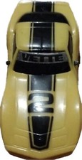 TYCO - '79 Corvette Yellow/Black 2 w/ window decal and NOS 440 Magnum Chassis