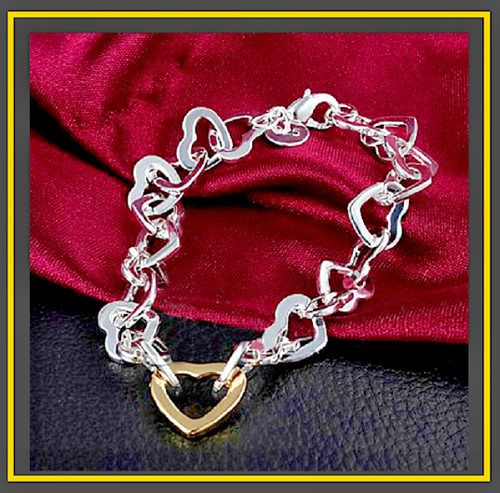 Bracelet En Argent Massif Avec Motifs Cœurs - Bijou Vintage D'occasion
